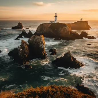 Lighthouse and coastal sea stacks at golden hour - Image 1