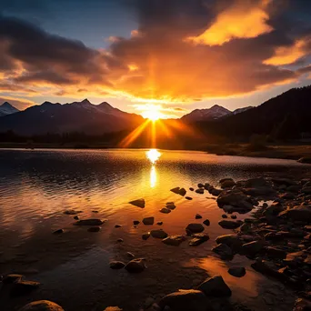 Alpine lake at sunset with golden reflections and mountains - Image 1