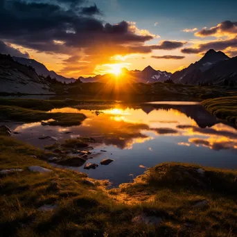 Alpine lake at sunset with golden reflections and mountains - Image 3