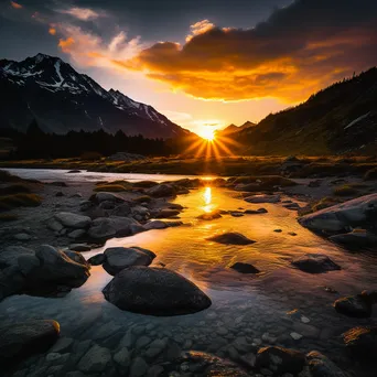 Alpine lake at sunset with golden reflections and mountains - Image 4