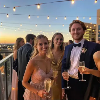 Glamorous rooftop party with elegant guests and champagne - Image 2