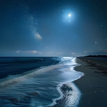 Starry sky above a tranquil beach with full moon - Image 2