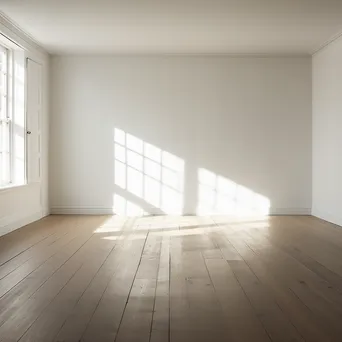 Empty white room with light streaming through a window - Image 4