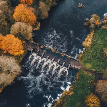 Aerial view of traditional weir in a river bend - Image 4