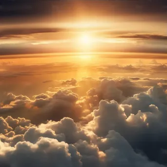 Golden sun setting over dramatic clouds seen from airplane window - Image 3