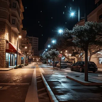 City street with adaptive streetlights adjusting brightness. - Image 1