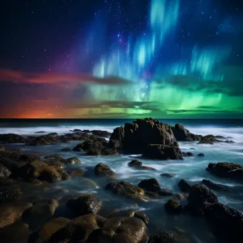 Southern lights on coastal landscape - Image 1