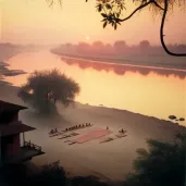 Yoga Students practicing at an outdoor ashram by the Ganges river during sunrise - Image 2