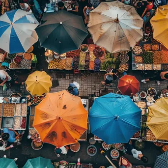 Overhead view of a bustling food market with diverse street food offerings. - Image 3