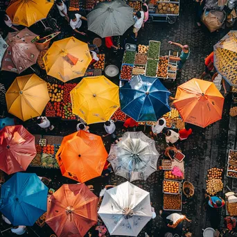 Overhead view of a bustling food market with diverse street food offerings. - Image 4