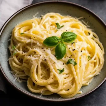 Creamy pasta dish with basil and parmesan, shot on Google Pixel 4 - Image 4