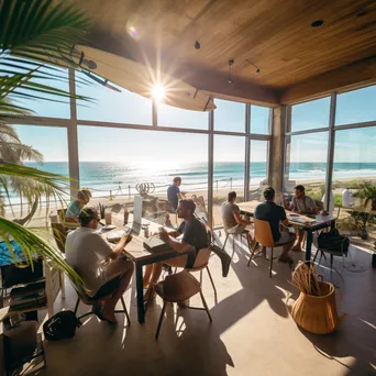 Young professionals networking in a coastal co-working space - Image 1