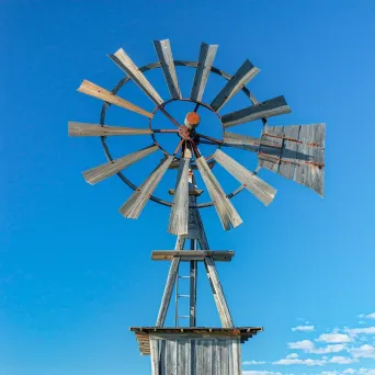 Rustic vintage windmill with wooden blades - Image 3