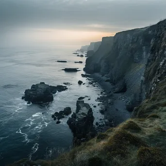 Coastal cliffs in mist at dusk - Image 3