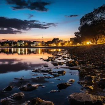 Long exposure photo of reflections on a river at dusk - Image 1