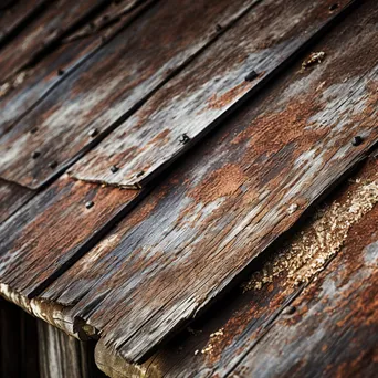 Weathered wood and rusty roof of a historic barn - Image 4