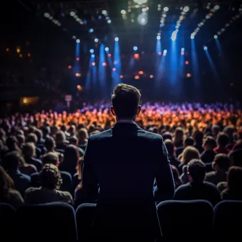 Keynote speaker on stage with an attentive audience - Image 2