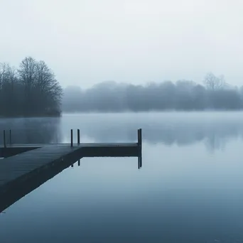 Blurred view of a misty lake at dawn - Image 3