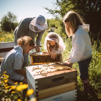 Family with children learning beekeeping at traditional apiary on a sunny day. - Image 2