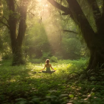 Yogi in tree pose in a forest glade - Image 4