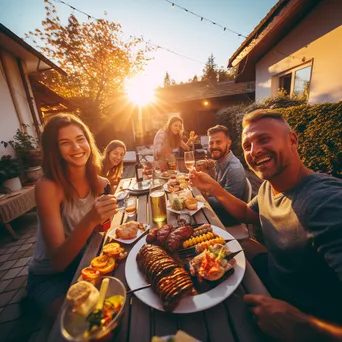 Family happily gathering around a barbecue table in the backyard - Image 2