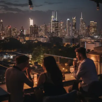 Rooftop bar with city skyline view and cocktails - Image 3