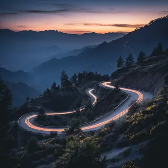 Mountain pass at twilight with trees and rocky silhouettes - Image 3