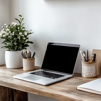 Elegant Desk with Stationery and Laptop