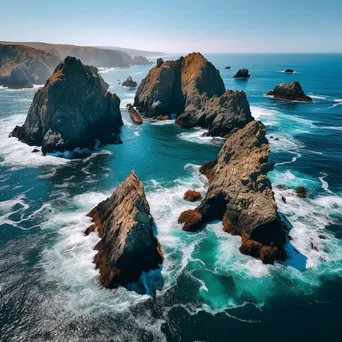 Aerial view of sea stacks and turquoise water - Image 3