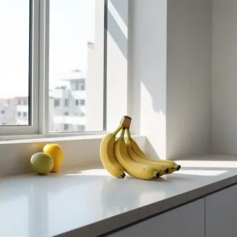 Yellow banana on minimalist kitchen counter - Image 2