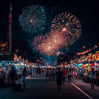 Colorful fireworks over a lively street festival for Independence Day. - Image 1