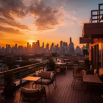 Rooftop terrace overlooking a city skyline during sunset - Image 2