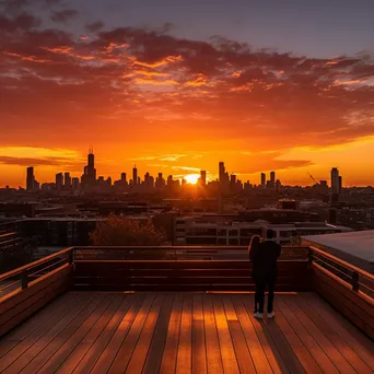 Rooftop terrace overlooking a city skyline during sunset - Image 4