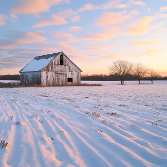 Rustic barn in winter field at sunset - Image 3