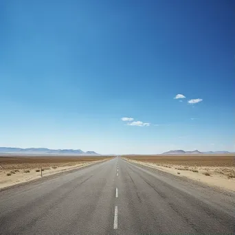 Image of an open road stretching towards a distant horizon - Image 1