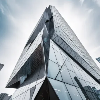 Modern skyscraper with diamond-shaped windows reflecting cityscape - Image 3