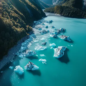 Formation of icebergs in a turquoise glacial bay - Image 1