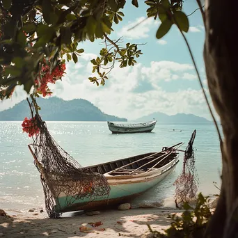 Traditional pearl diving boat on sandy beach - Image 2