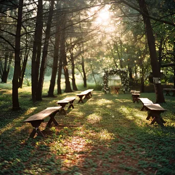 Outdoor wedding ceremony in a forest with floral altar. - Image 3