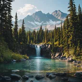 Peaceful mountain waterfall entering a clear pool surrounded by trees - Image 3