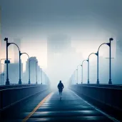 Solitary jogger on an urban bridge at dawn with misty skyline - Image 4