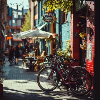 Eclectic city bikes parked near colorful cafes on a sunny day - Image 3