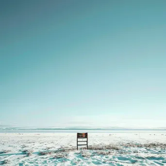 An isolated chair in a snowy field shot on Canon EOS R6 - Image 3