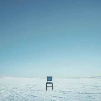 An isolated chair in a snowy field shot on Canon EOS R6 - Image 4