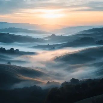 Misty Dawn Over Rolling Hills