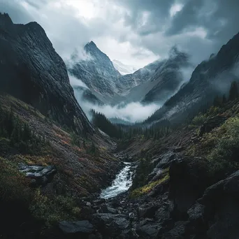 Mountain valley under stormy skies with rain and rugged terrain - Image 2