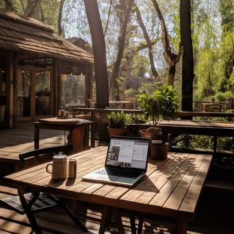 Outdoor Cafe Workspace with Laptop