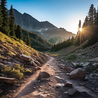 Rocky mountain pass at dusk with glowing light - Image 1