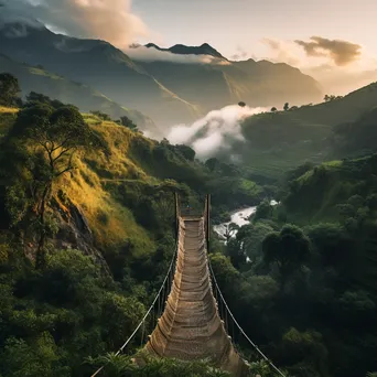 Traditional rope bridge over a green valley at dawn - Image 3