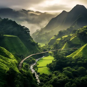 Traditional rope bridge over a green valley at dawn - Image 4